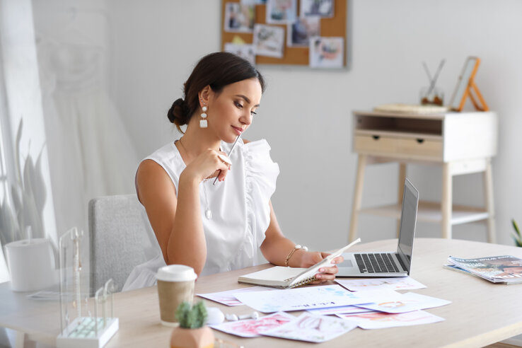 Event planner checking off a to-do list